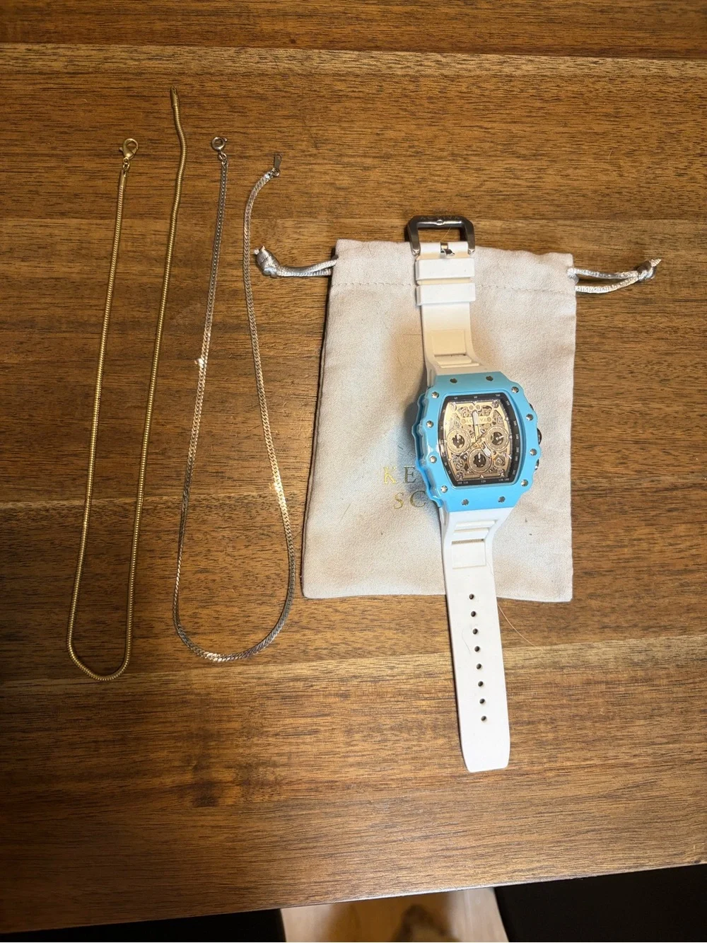 Bundle of Gold and Silver Herringbone necklaces and two watches